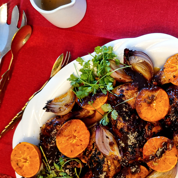 Chicken pieces with burnt clementine sauce 